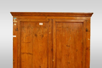 Antique rustic Italian wardrobe from the 1700s in fir wood