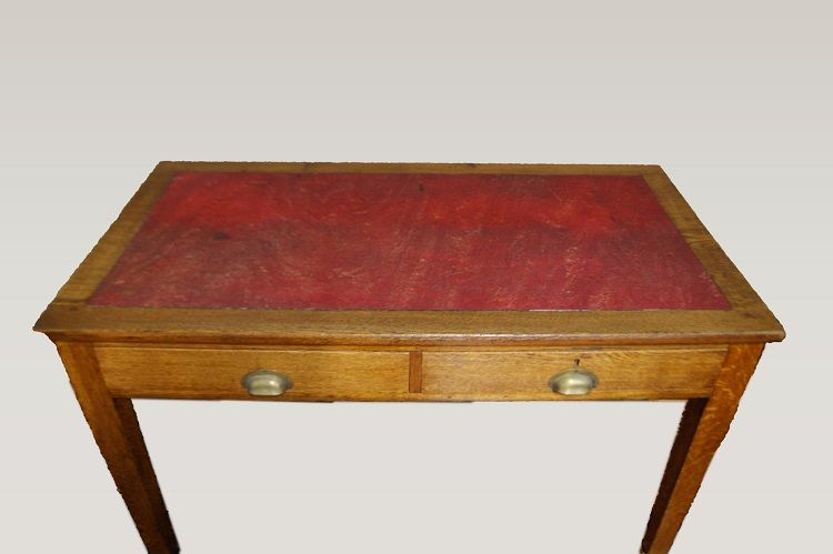Antica scrivania italiana di inizio 1900 in rovere con piano in pelle