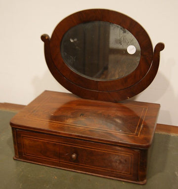 Oscillating mirror in mahogany feather