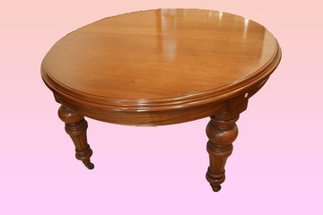 Antique English extendable table from the 1800s restored in mahogany