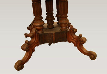 Antique oval table from 1800 Louis Philippe in mahogany and feather