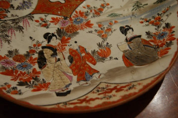 Antique oriental porcelain plate from the 1800s decorated with characters