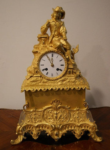 Orologio da tavolo stile Impero in bronzo dorato