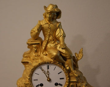 Empire style gilt bronze mantel clock from 1800