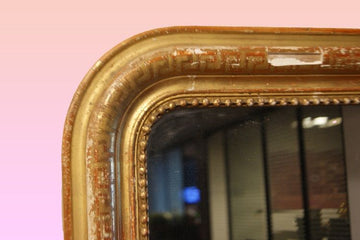 Rectangular mirror with beveled upper corners