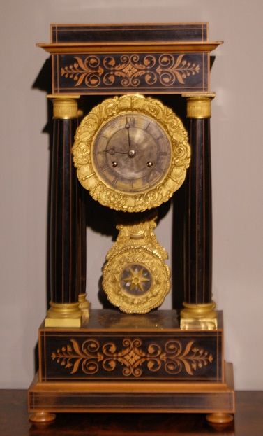 Orologio Carlo X in bosso e legno ebanizzato