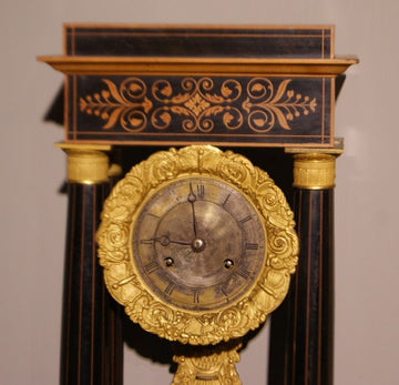Orologio Carlo X in bosso e legno ebanizzato