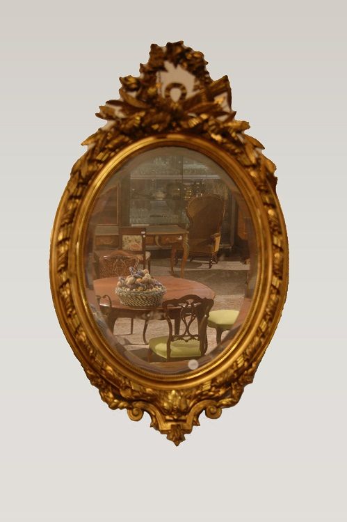 Specchiera ovale con cimasa stile Luigi XV