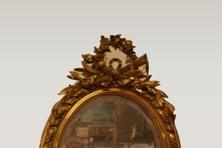 Specchiera ovale del 1800 con cimasa foglia oro