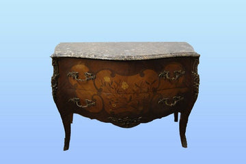 Antique French Louis XV style chest of drawers from 1800 with inlays