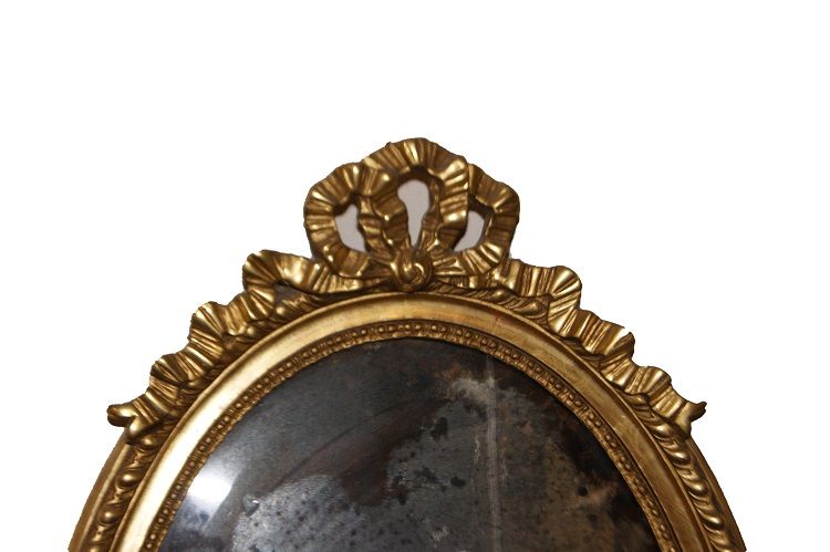 Antica specchiera Luigi XVI con cimasa foglia oro