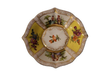 Yellow Meissen porcelain cup and saucer
