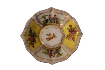 Tasse et soucoupe en porcelaine de Meissen jaune