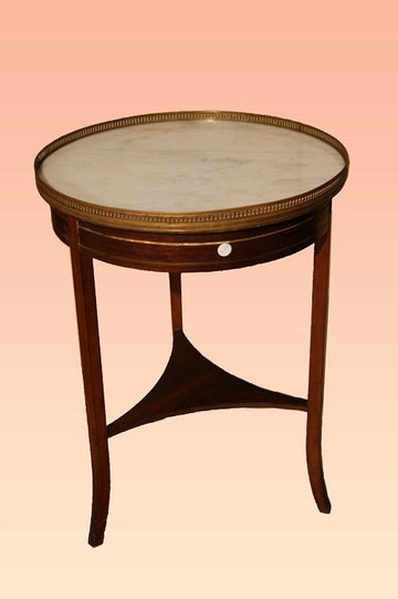 Antique circular coffee table from the 19th century with marble top