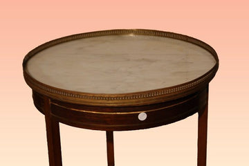 Antique circular coffee table from the 19th century with marble top