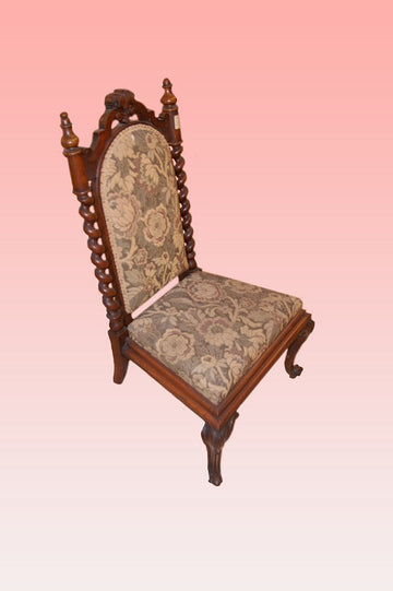 Low English Georgian style fireplace chair from the 1800s