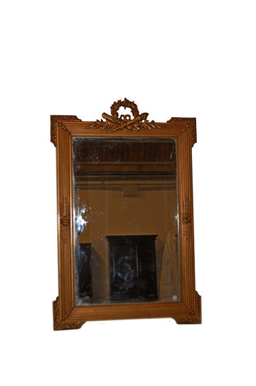 French Louis XVI style mirror in gold leaf gilded wood