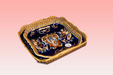 Coppia piattini in ceramica francese riccamente decorati