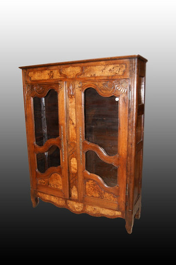 Antique French display cabinet from the 1700s in dark Provençal chestnut wood