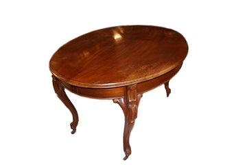 Extendable oval table from the 1800s Biedermeier style in mahogany wood