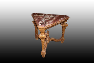 Mid 19th century Louis XIV style triangular side table in gold leaf gilded wood