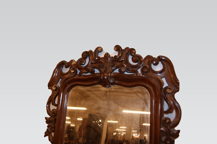 Specchiera stile Luigi Filippo in legno di mogano riccamente intagliata