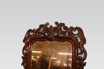 Louis Philippe style mirror in richly carved mahogany wood