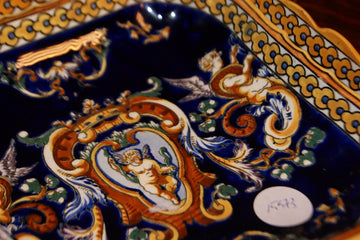 Paire de soucoupes en céramique française richement décorées
