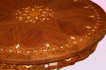 Richly inlaid French Louis XV style table with 4 chairs