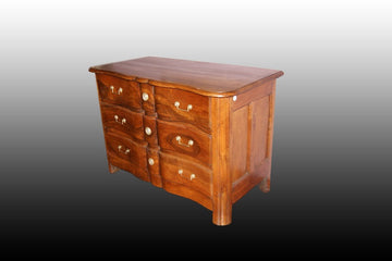 Belle commode française de la fin du XVIIIe siècle de style Régence en bois de noyer massif