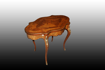 French center table from the 19th century, Louis XV style, richly finished with bronzes and inlays