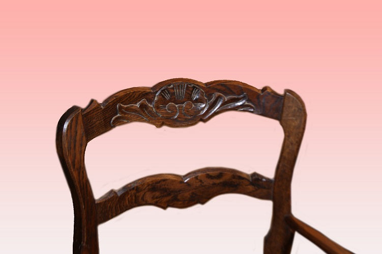 Coppia di poltrone provenzali di fine 1800 in legno di rovere con intagli